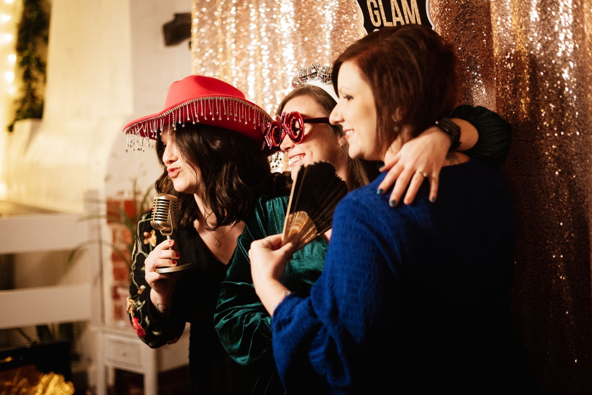 Guests having fun in a photobooth at a wedding at Sopley Mill with Tasha Mae Wedding Co-ordinator.