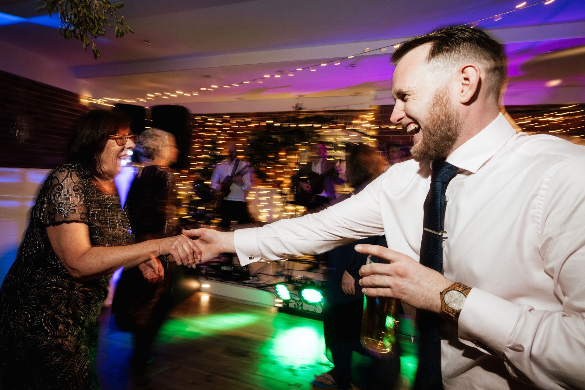 Guests dancing at a wedding at Sopley Mill with Tasha Mae Wedding Co-ordinator.