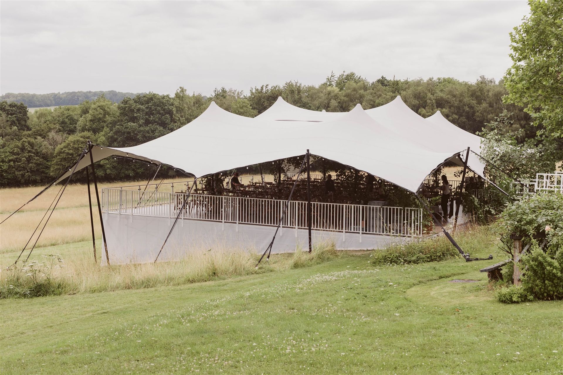 Stretch tent set up in a garden ready for a DIY wedding at home co-ordinated by Tasha Mae Wedding Co-ordinator.