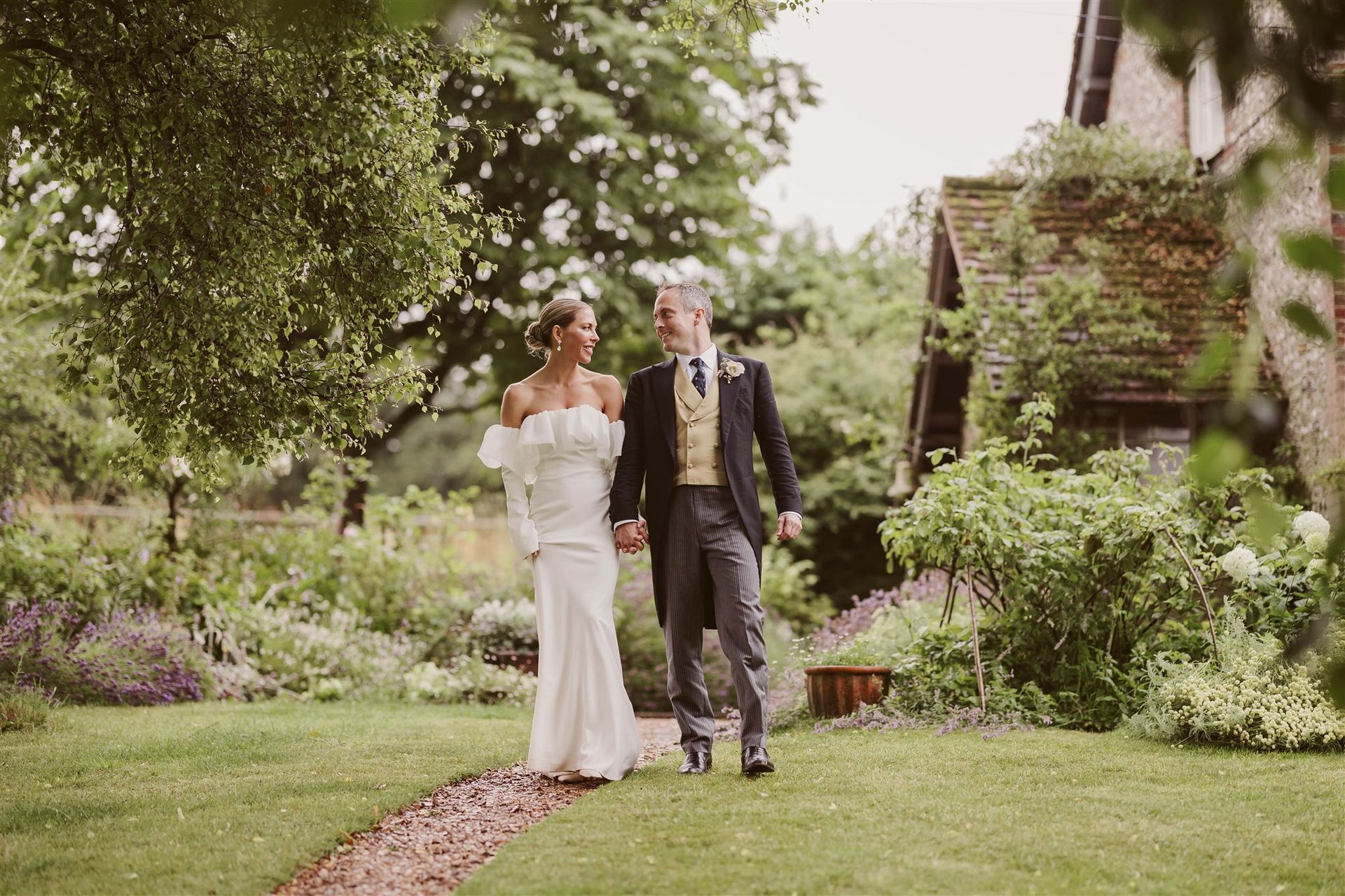 Bride and groom at their wedding at home in Hampshire co-ordinated by Tasha Mae Wedding Co-ordinator