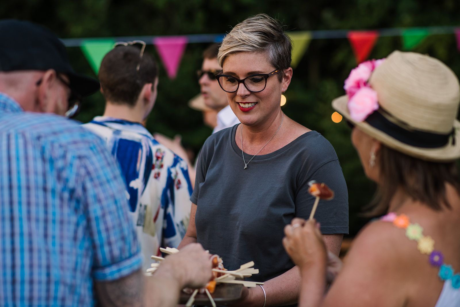 Tasha Mae Wedding Co-ordinator serving canapes at a 21st birthday party at a home in Wiltshire.