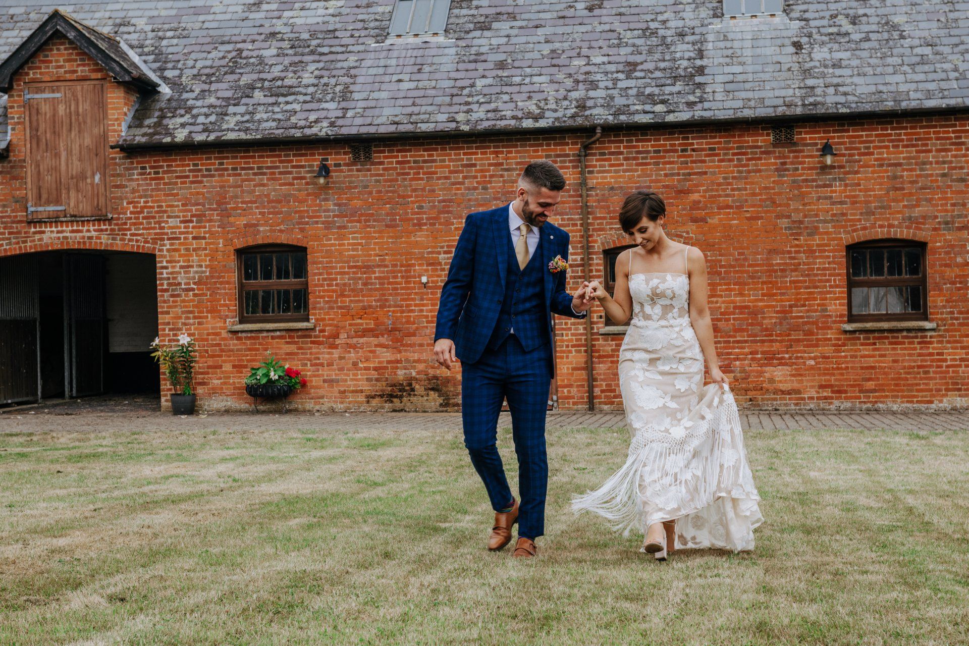 Bride and Groom on wedding day at Home Farm Barns, Ower.