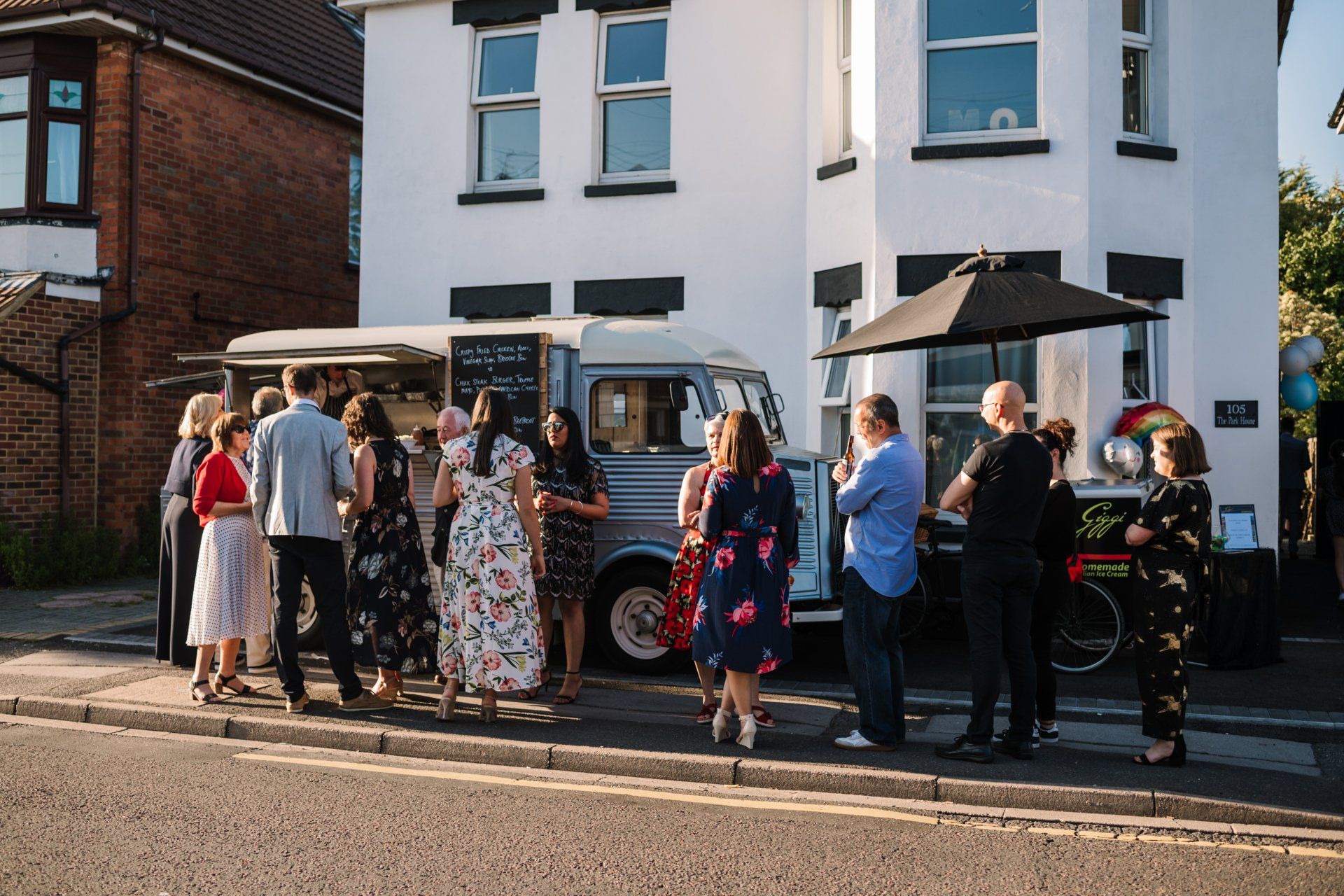 Wedding Guests going up to a mobile food van to collect their food at a DIY wedding co-ordinated by Tasha Mae Wedding Co-ordinator