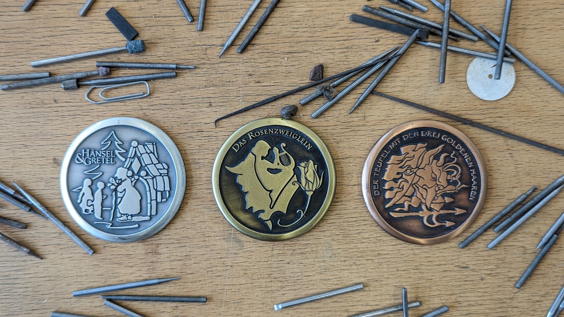 3 gravierte Medaillen