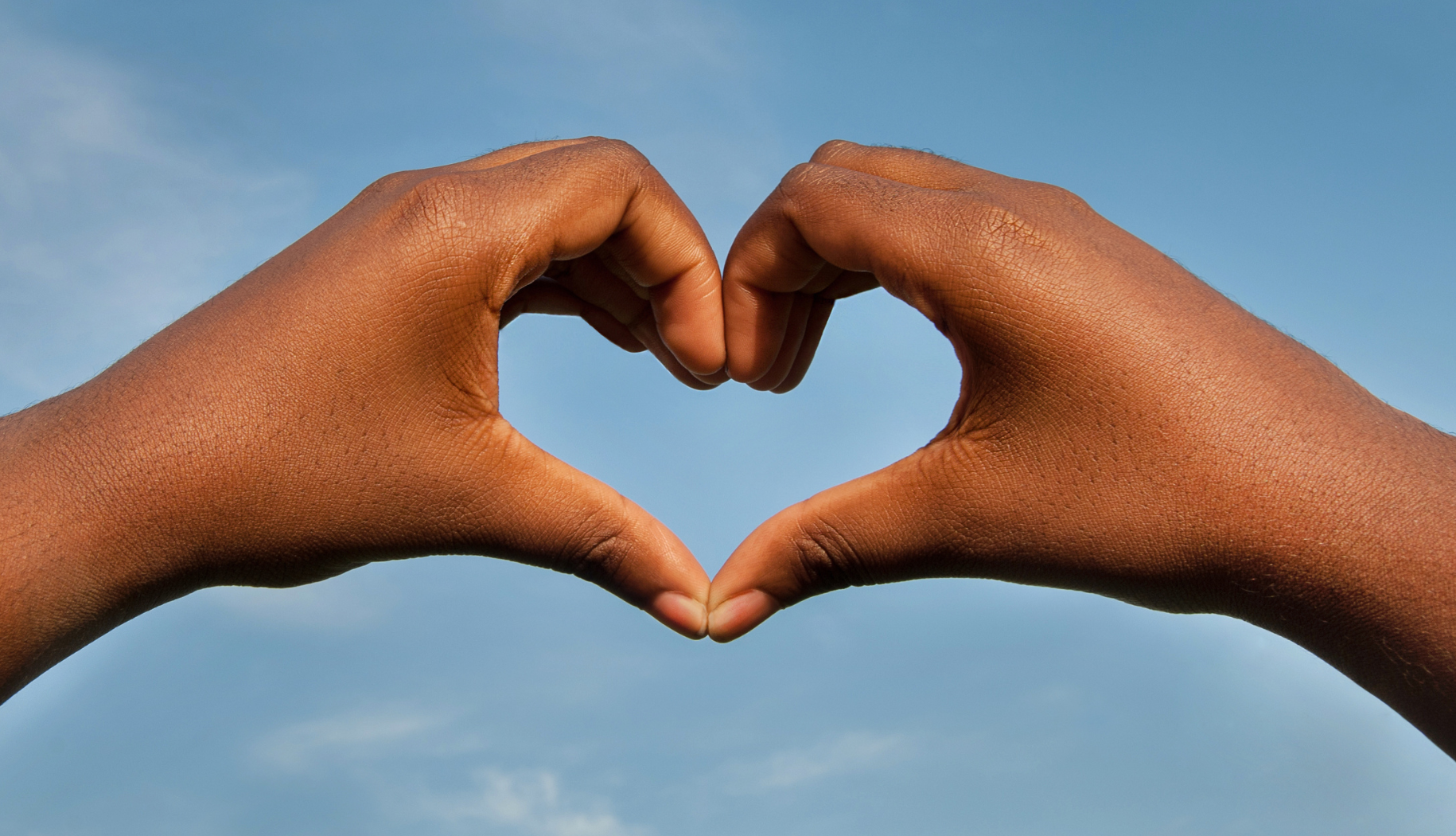 Two hands making a heart