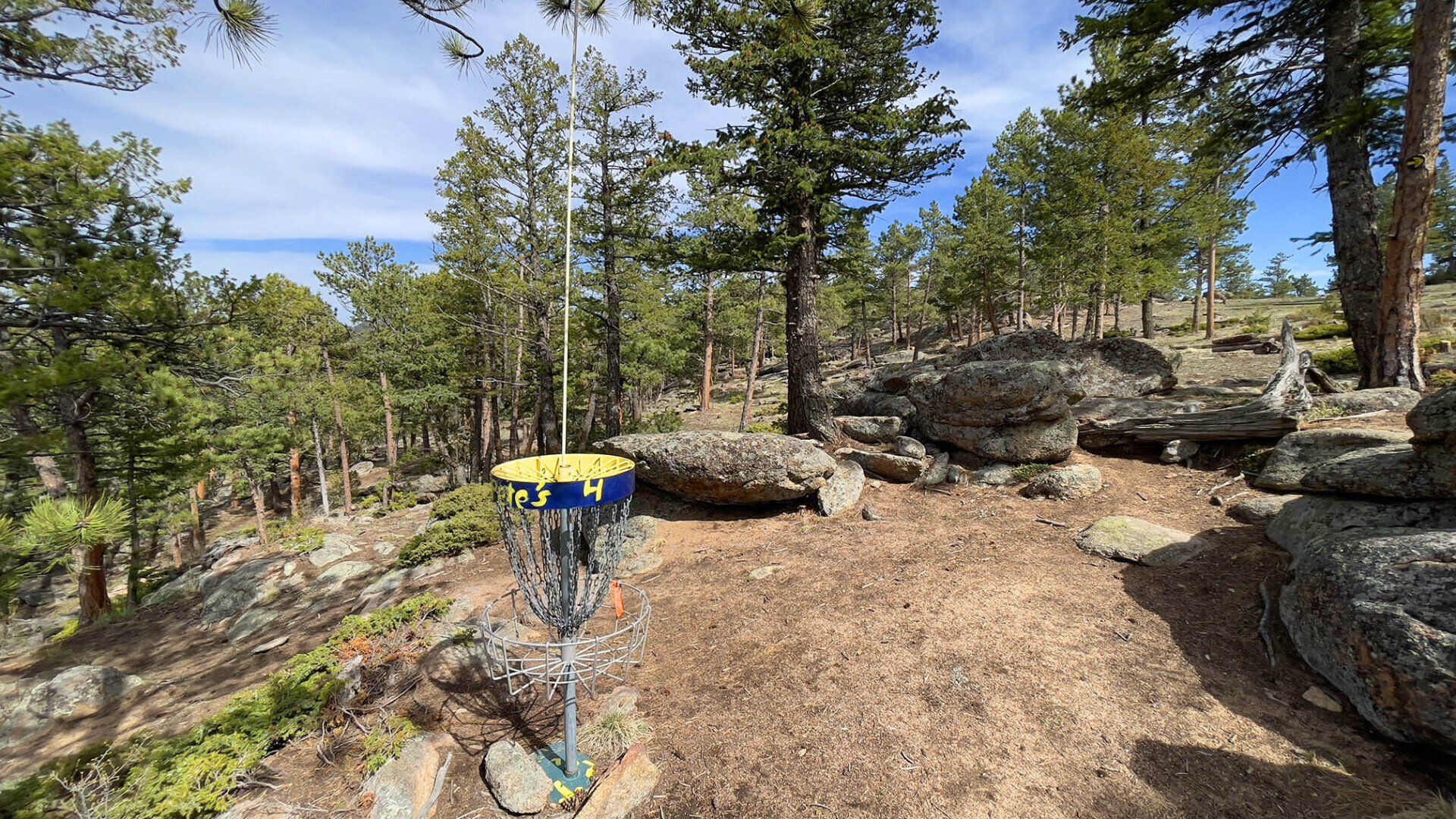 New disc golf hole 5 basket at Sundance Trail Guest Ranch May 2022