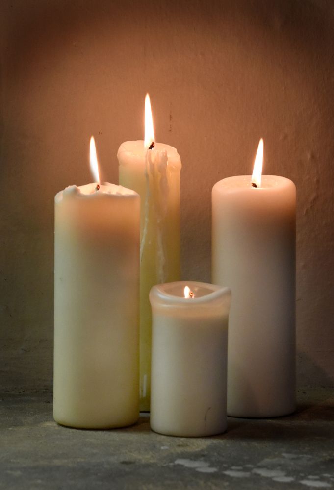 Four lit candles