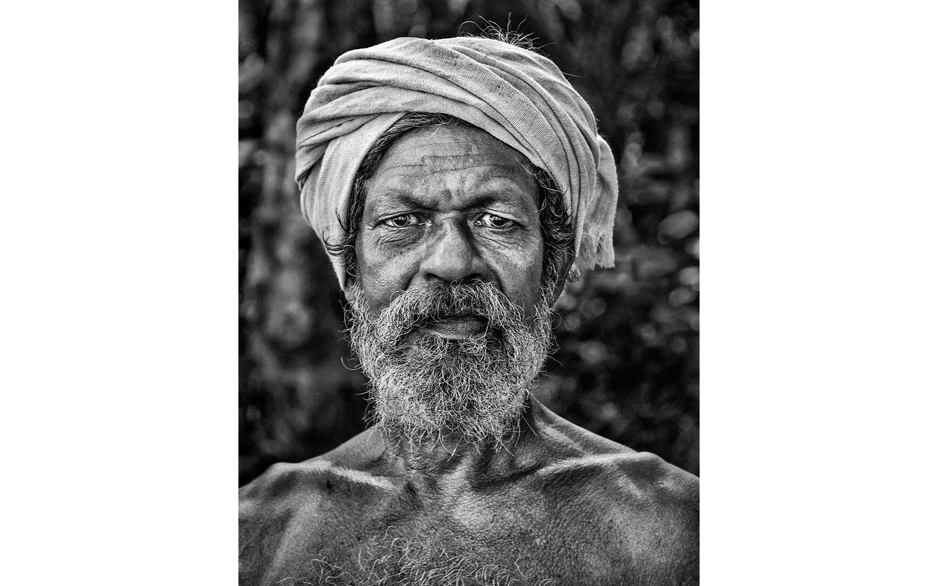 a portrait of an indian worker