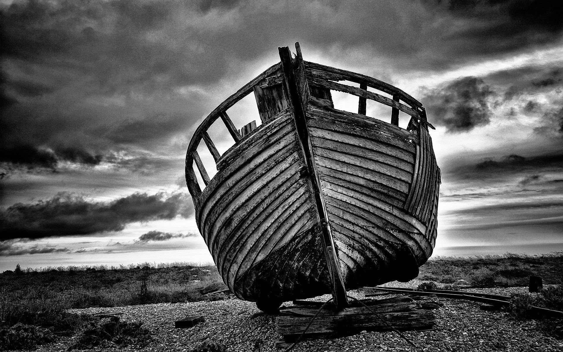 monochrome view of an old boat on a beach