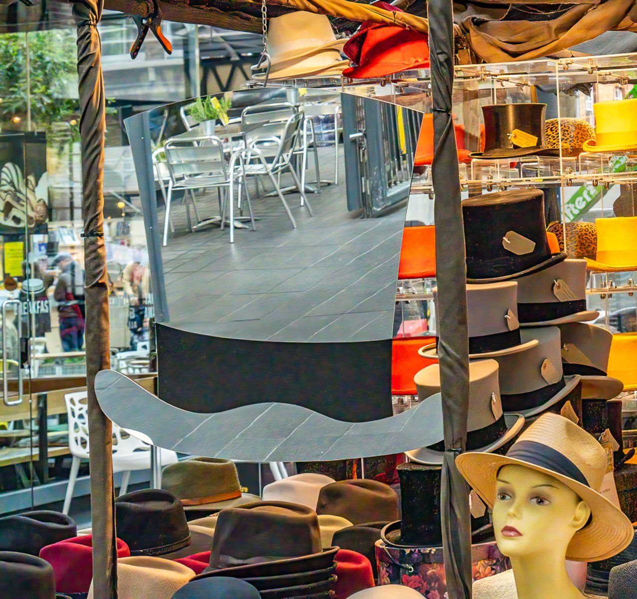 a market stall selling hats