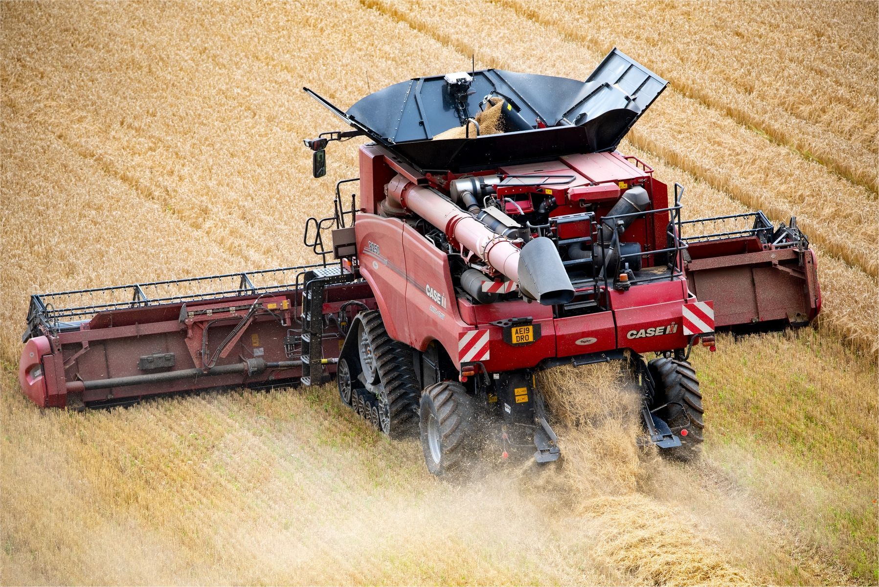 a combine harvester working in a field