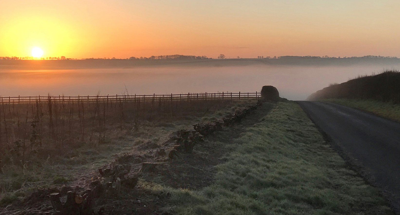 morning mist in the lincolnshire wolds at sunrise