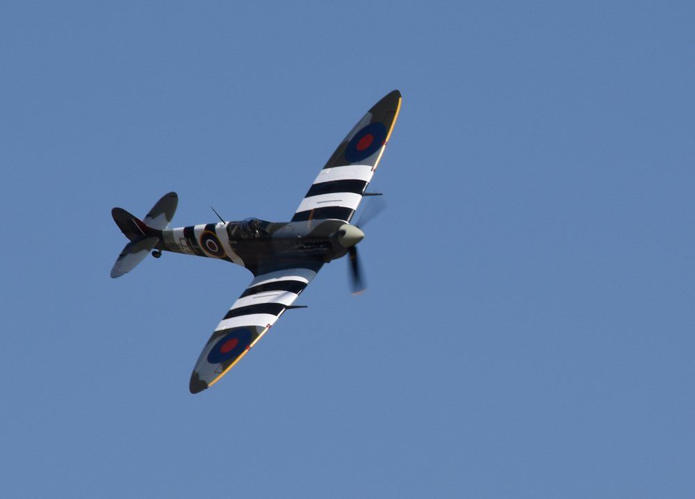 Photo by: Graham Harrison a spitfire fighter aircraft banking over louth