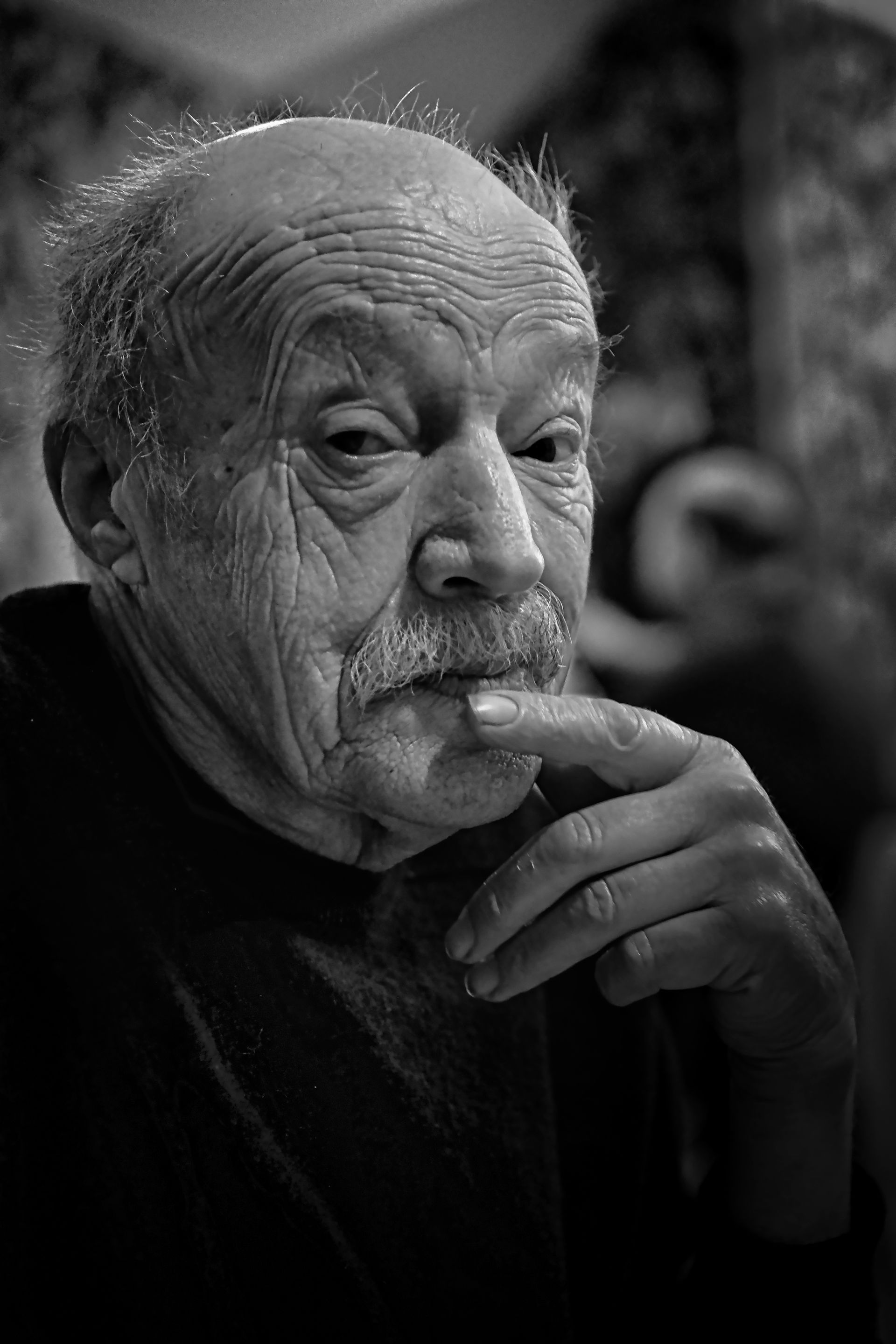 a portrait of an elderly man