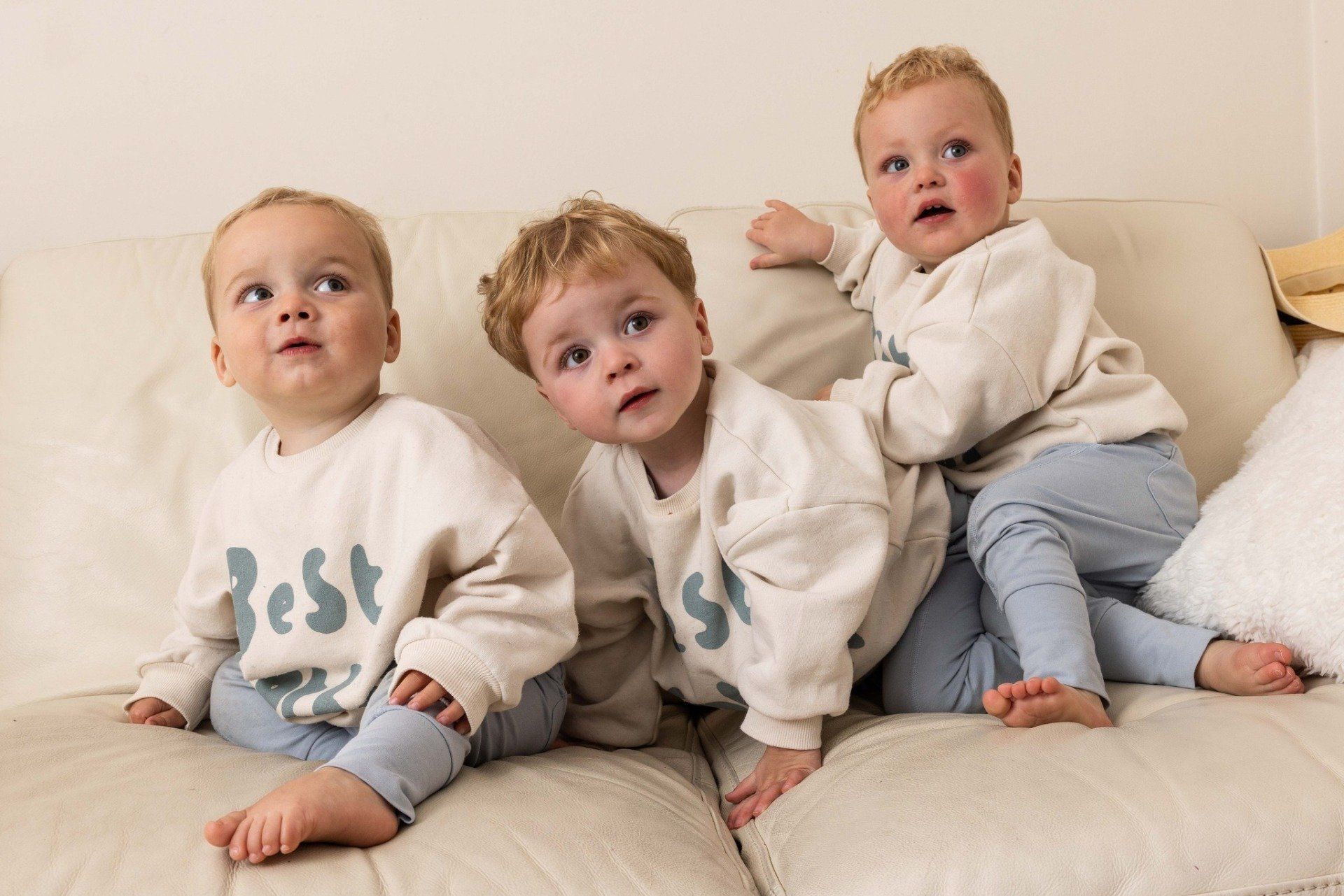 Photo by Ian Cathro three toddlers all dressed in the same outfits