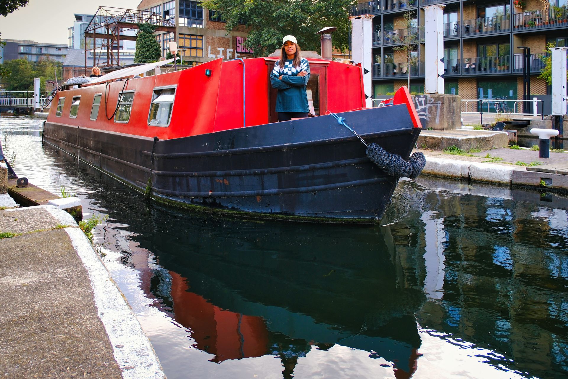 A barge sailing out of a lock