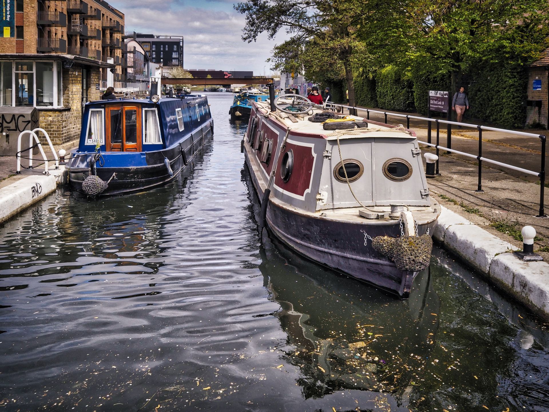 Barging by Derek Smith Narrowboat canal barges at a lock