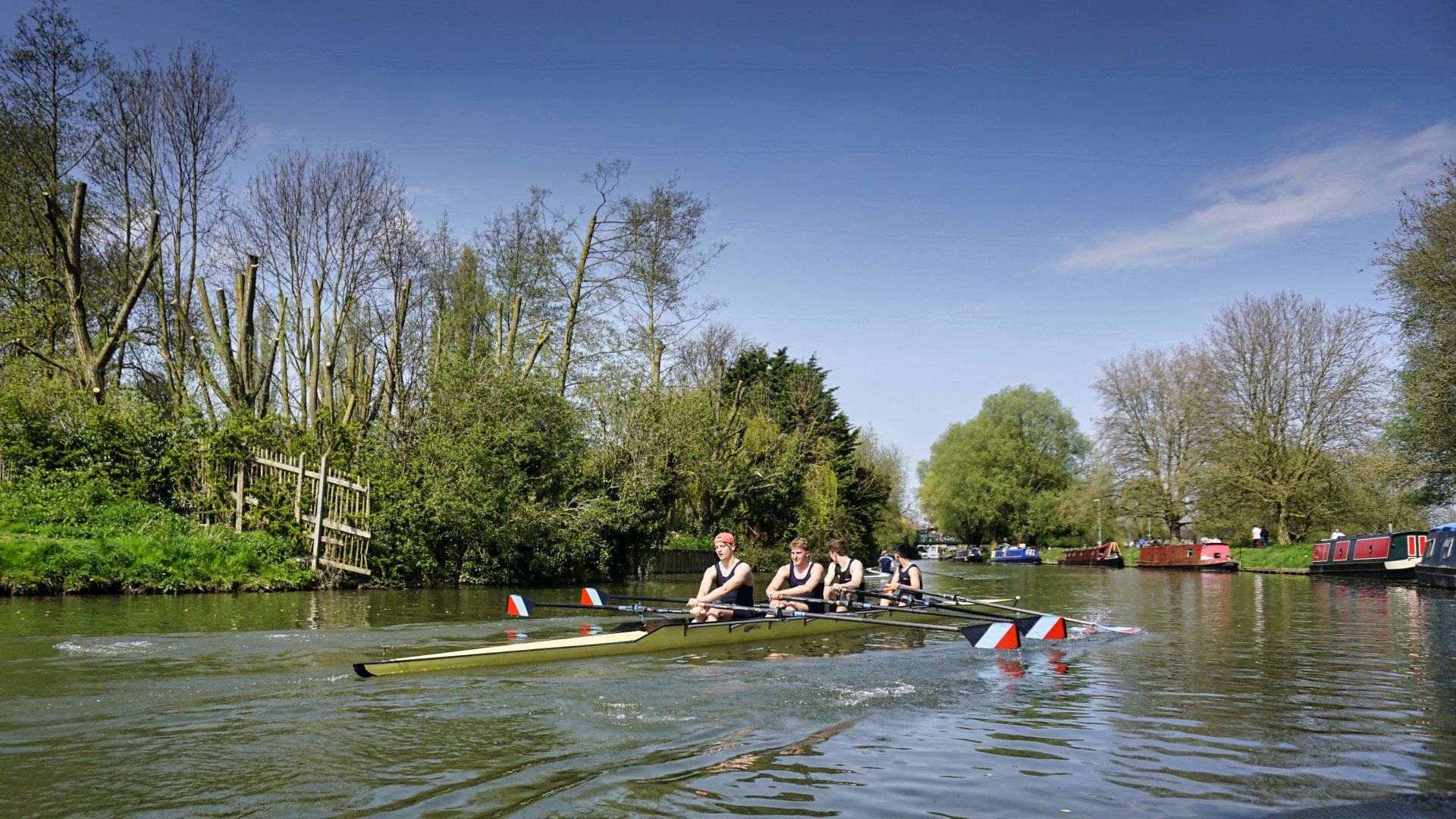Rowing Four by Derek Smith a rowing four boat on the river cam
