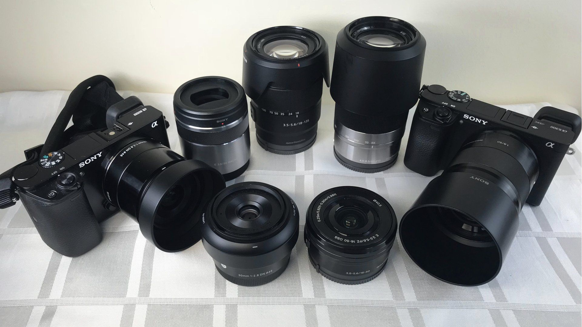 Photo by: Derek Smith the sony camera system, two cameras, and a range of lenses