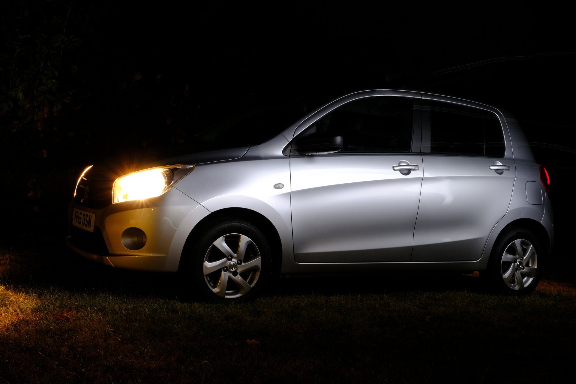 Car photo by Derek Smith a photo of a car taken at night