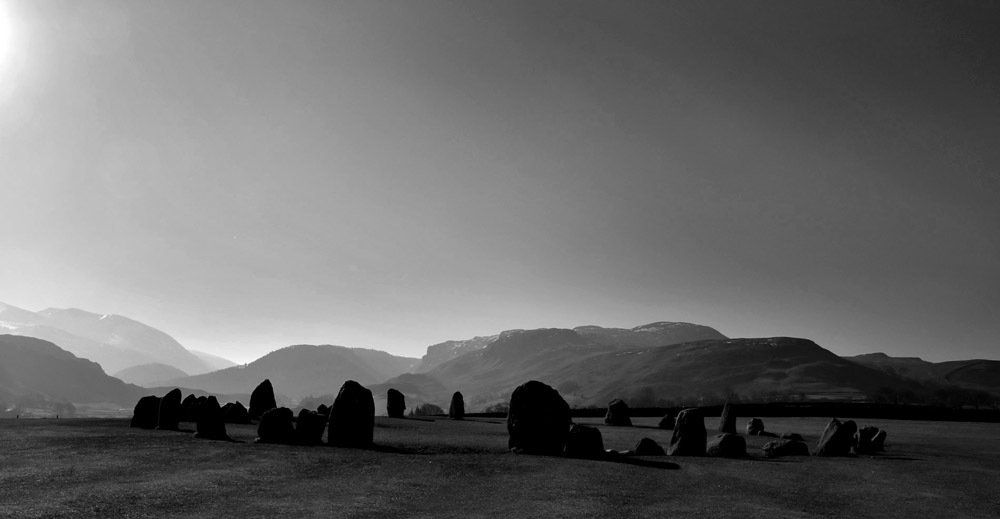 a view of castlerigg stone circle in monochrome