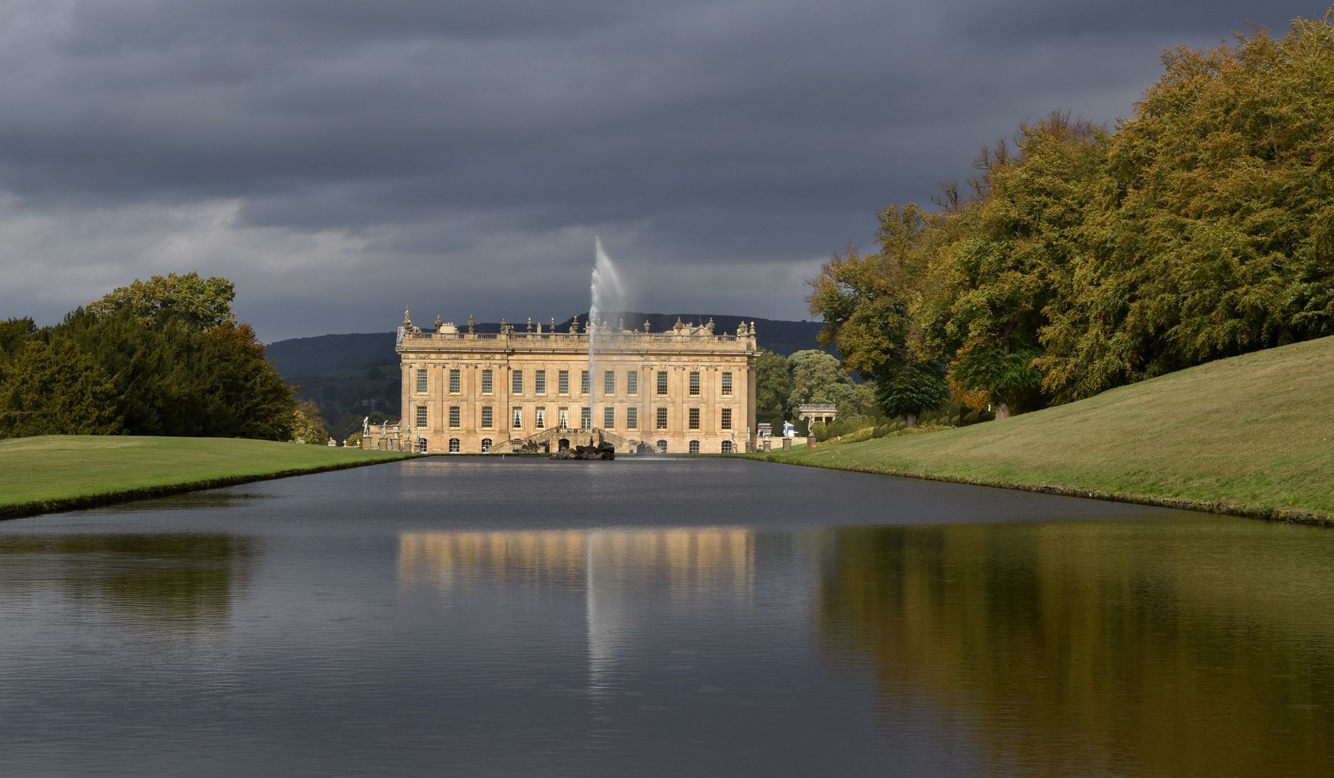 a view of Chatsworth House from the lake