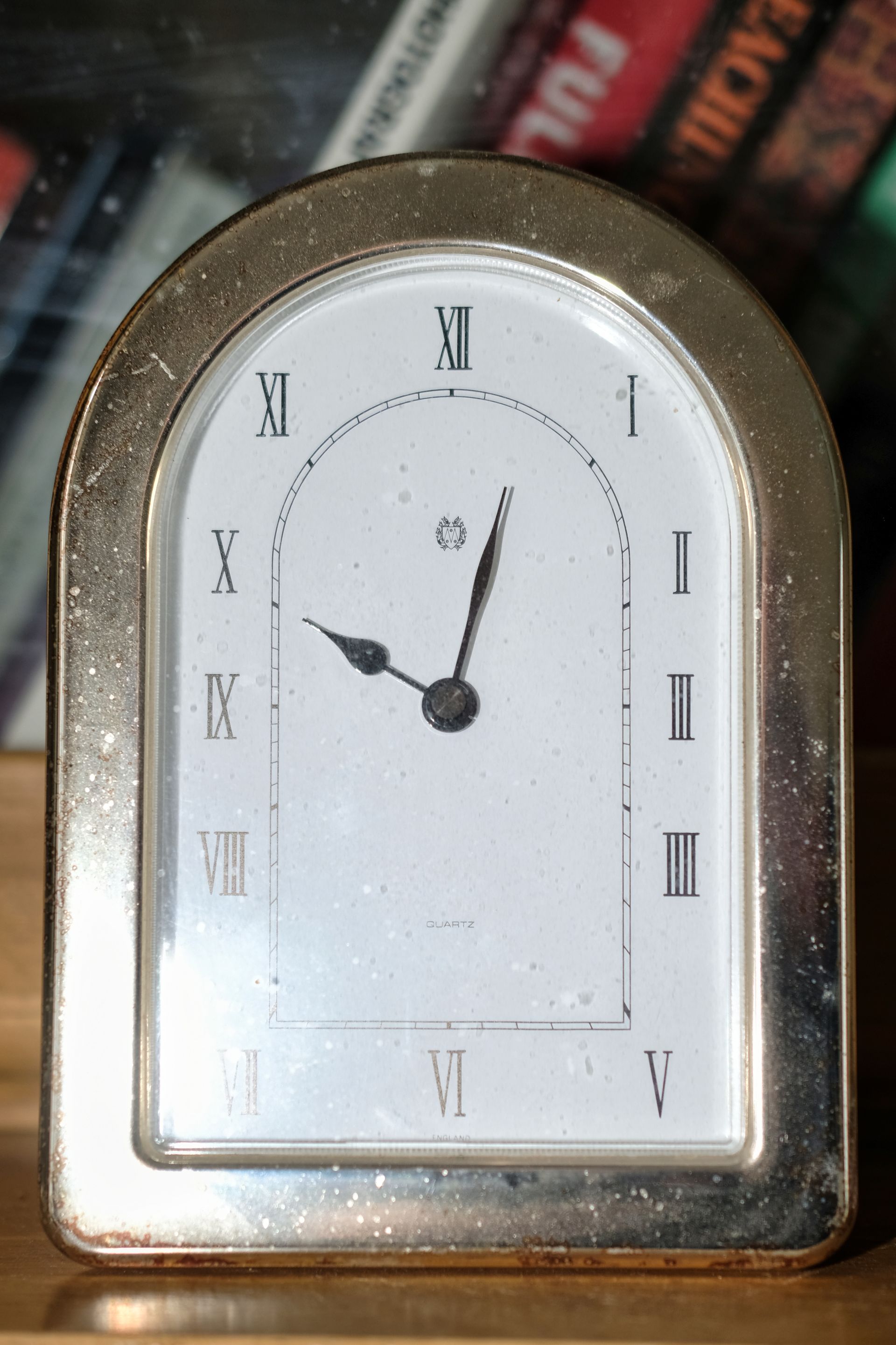 a photograph of a clock face taken with flash
