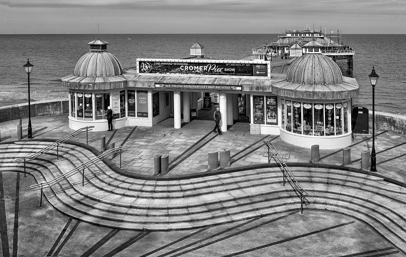 a monochrome view of Cromer Pier