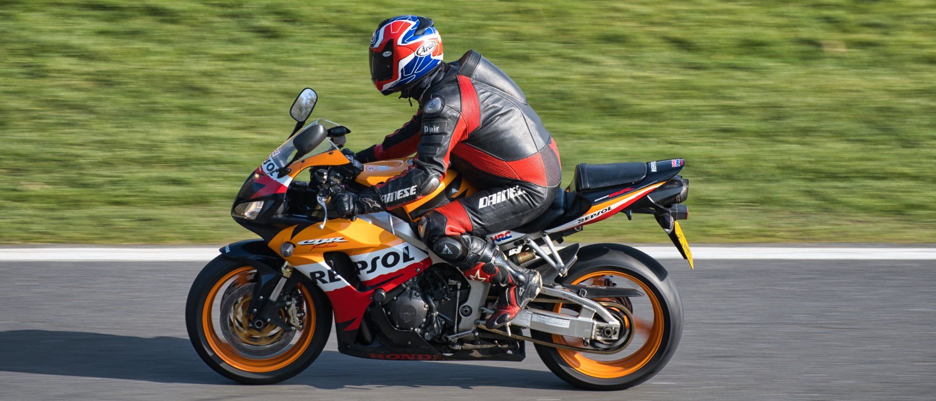 Photo by Derek Smith a racing motorbike on the cadwell park circuit