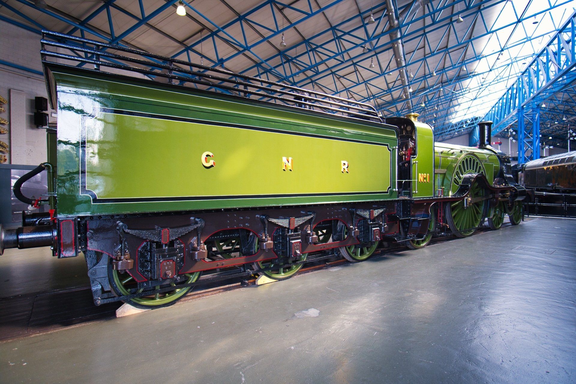 a bright green locomotive at the national railway museum