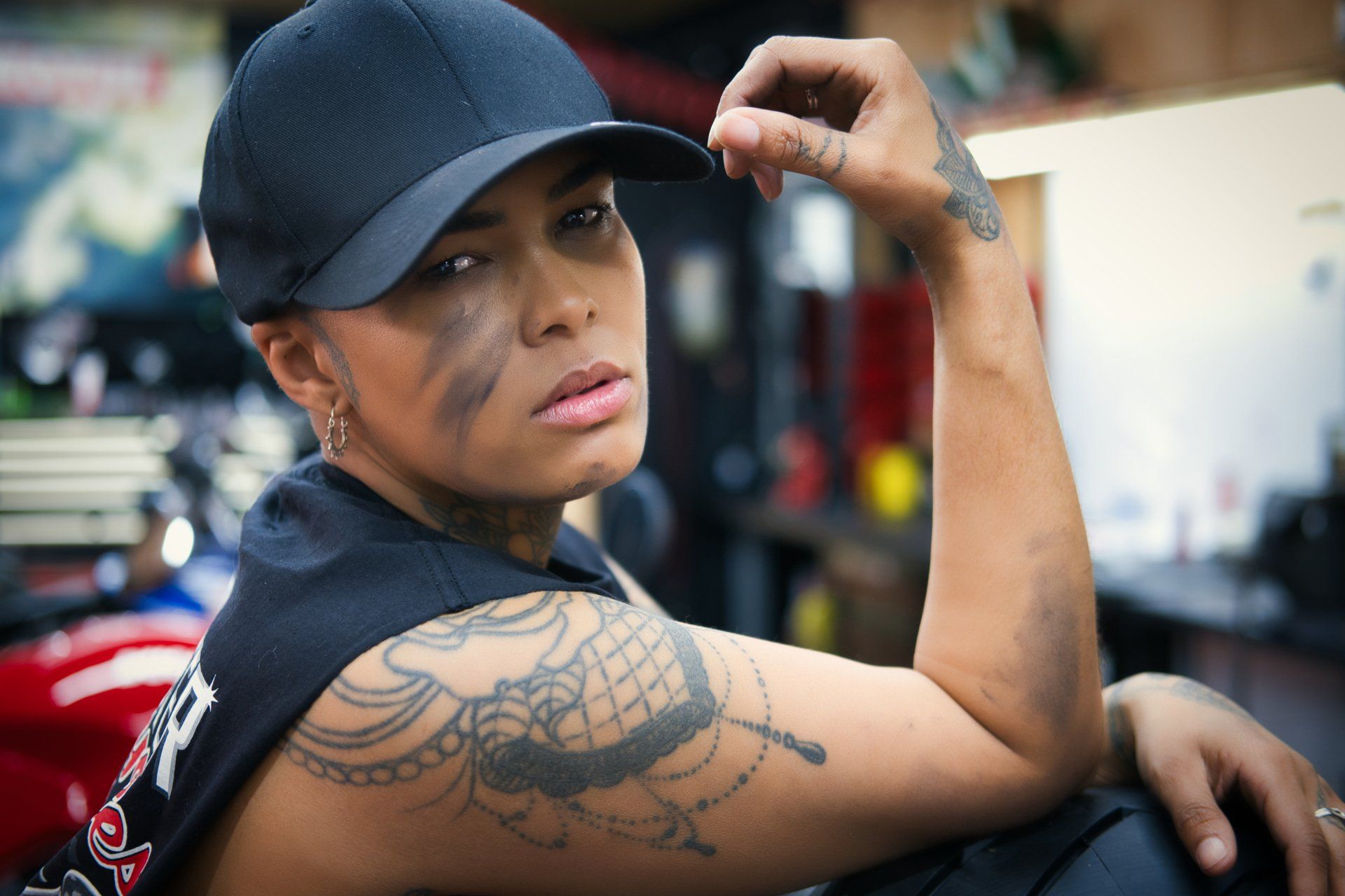 a female model in a peaked cap