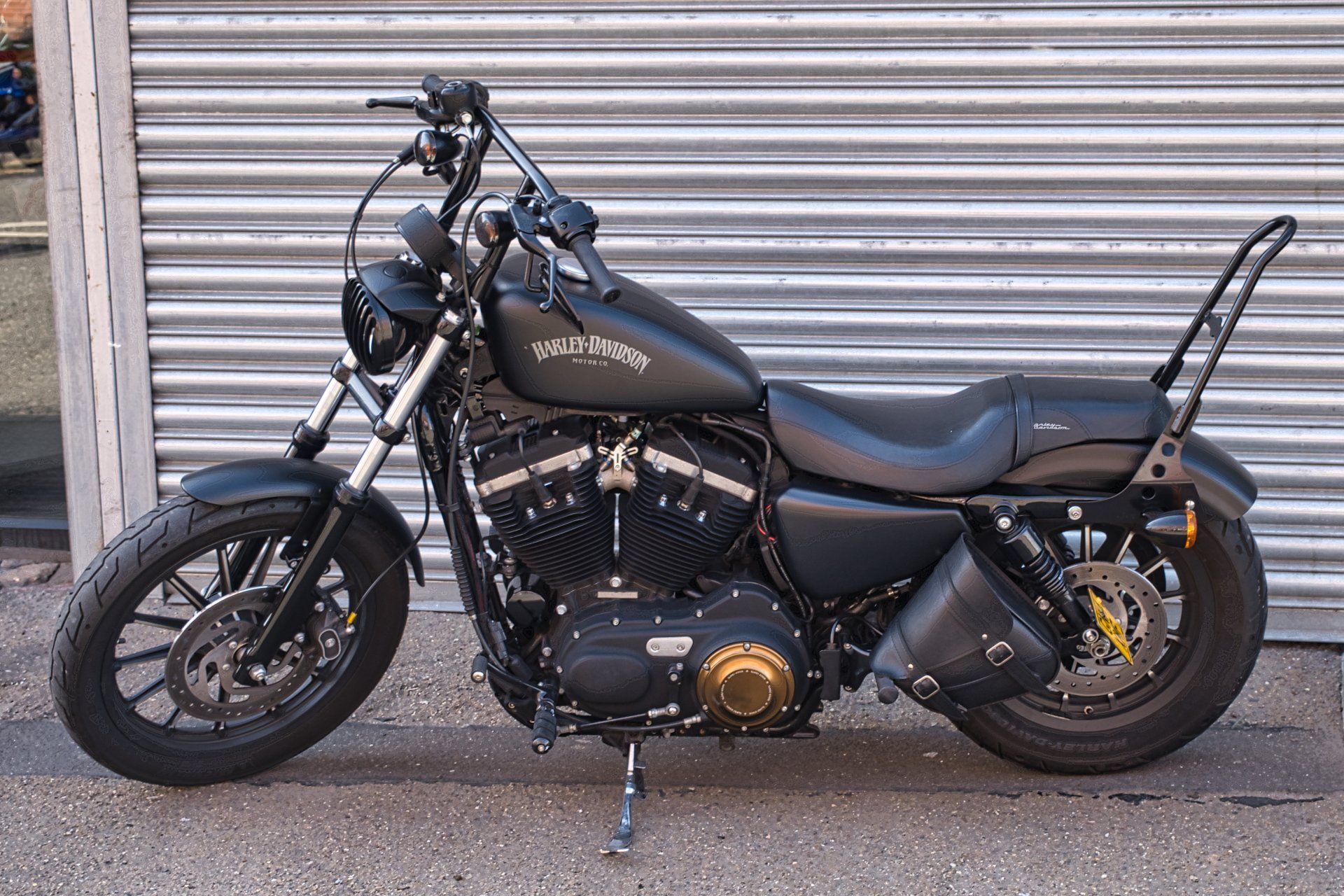 a black silk finish harley-davidson motorcycle