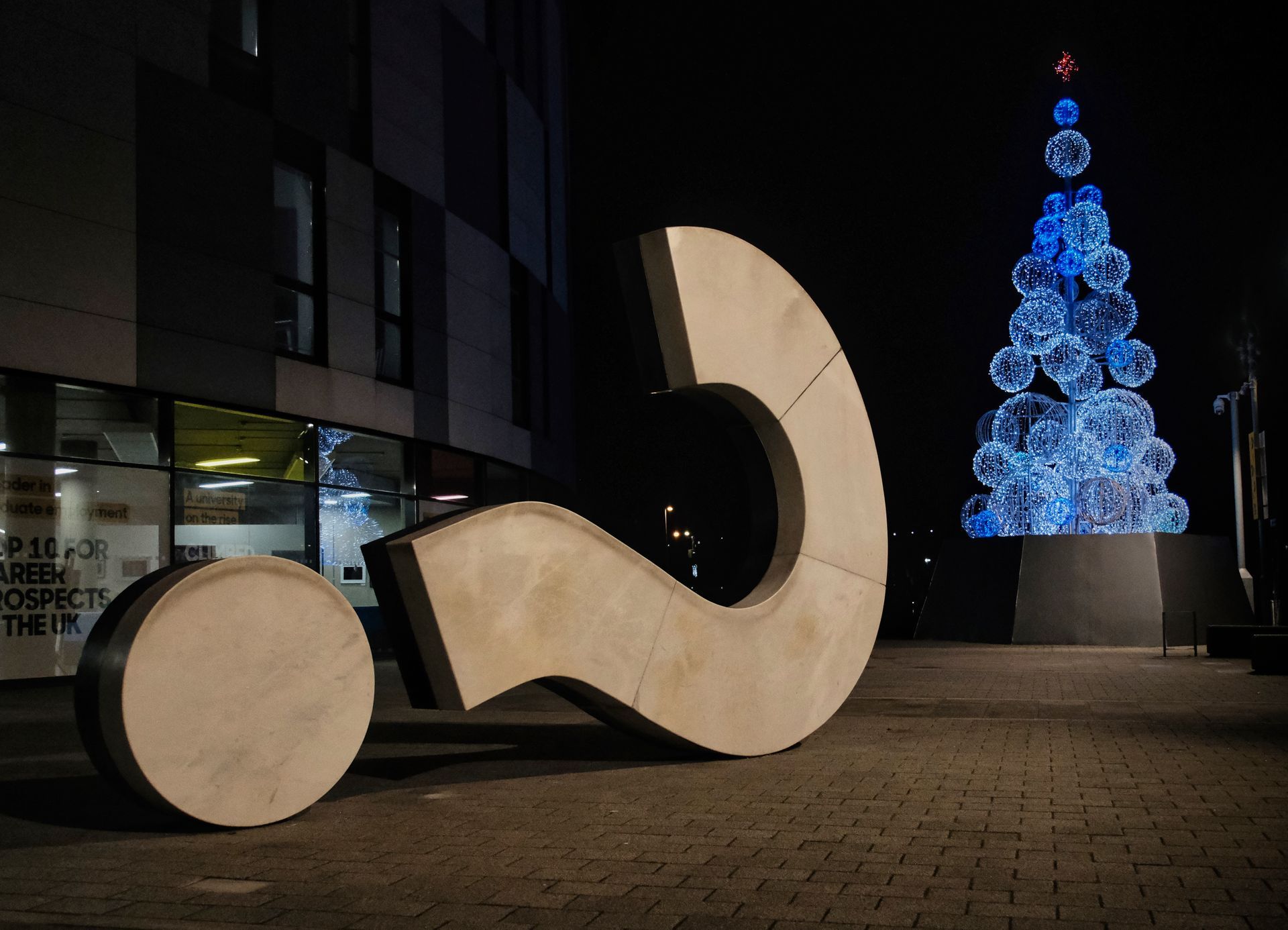 a Christmas tree at night