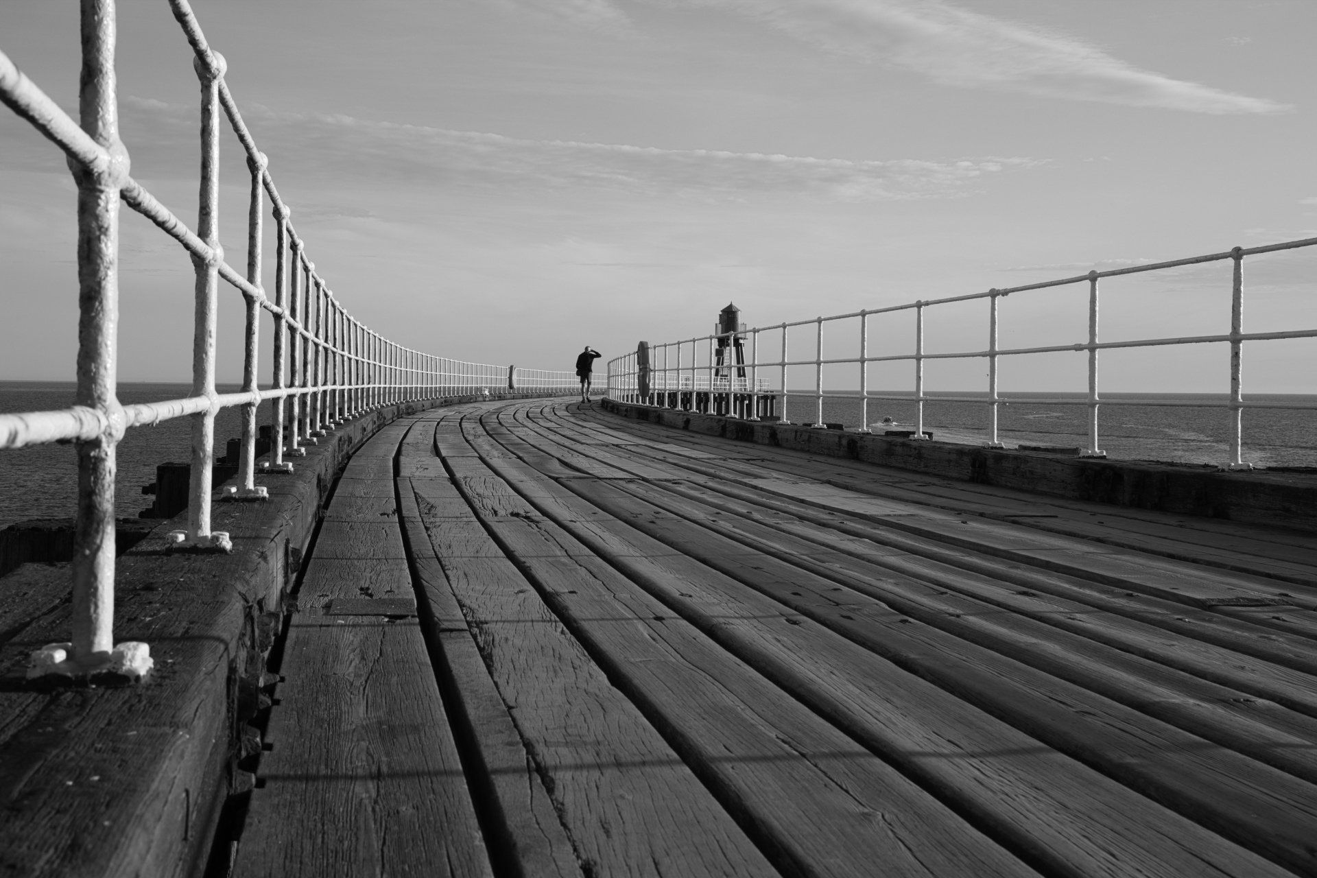 monochrome boardwalk at whitby