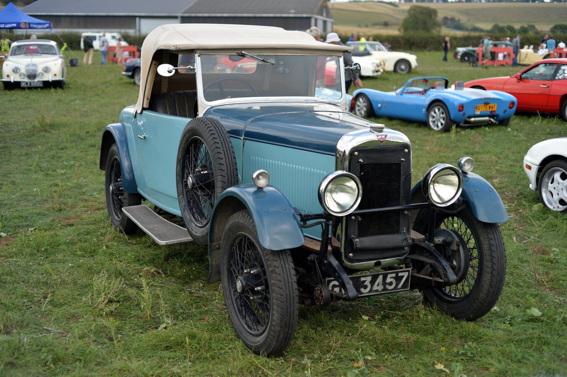 a vintage alvis open top car