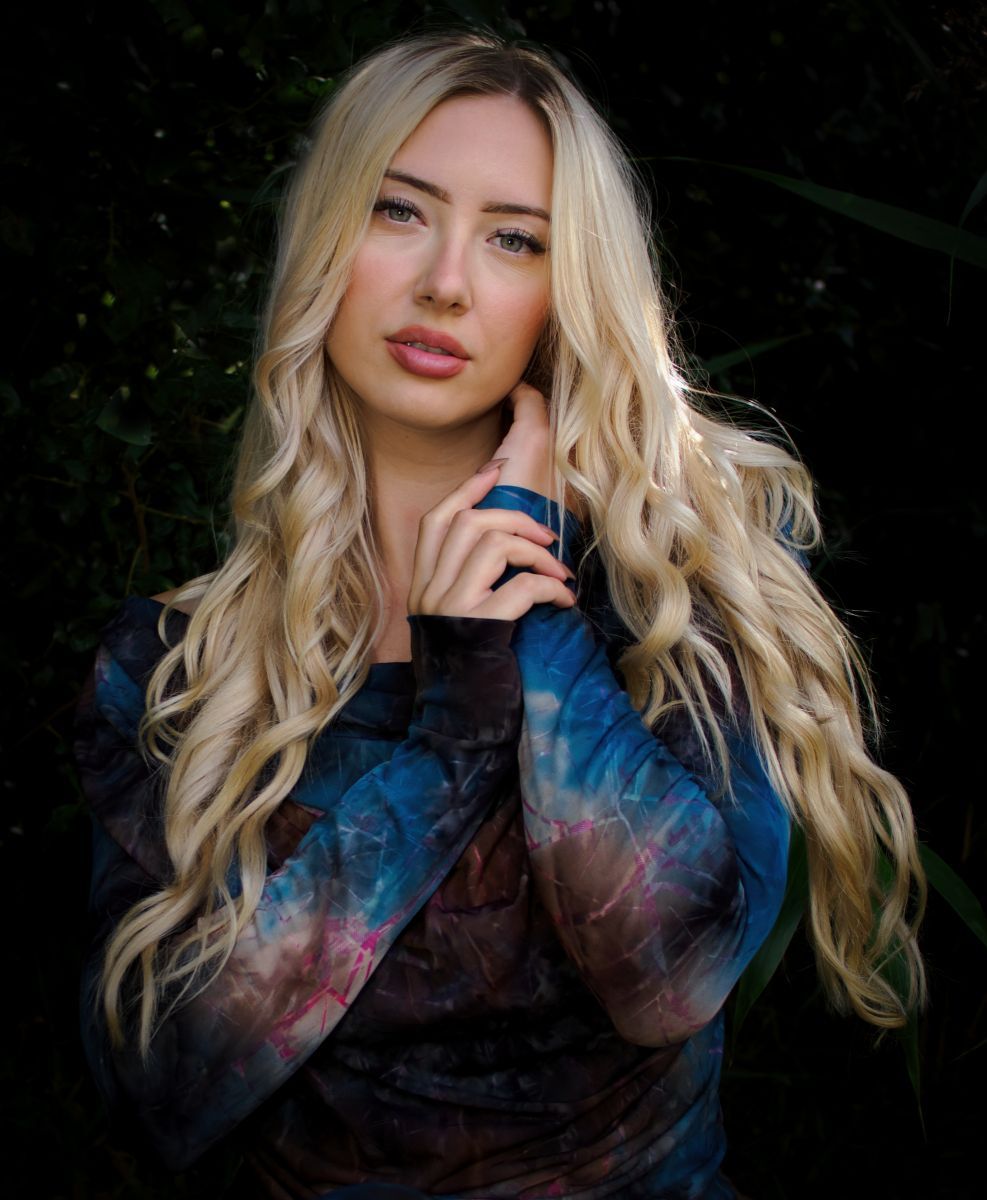 a portrait of a young female model