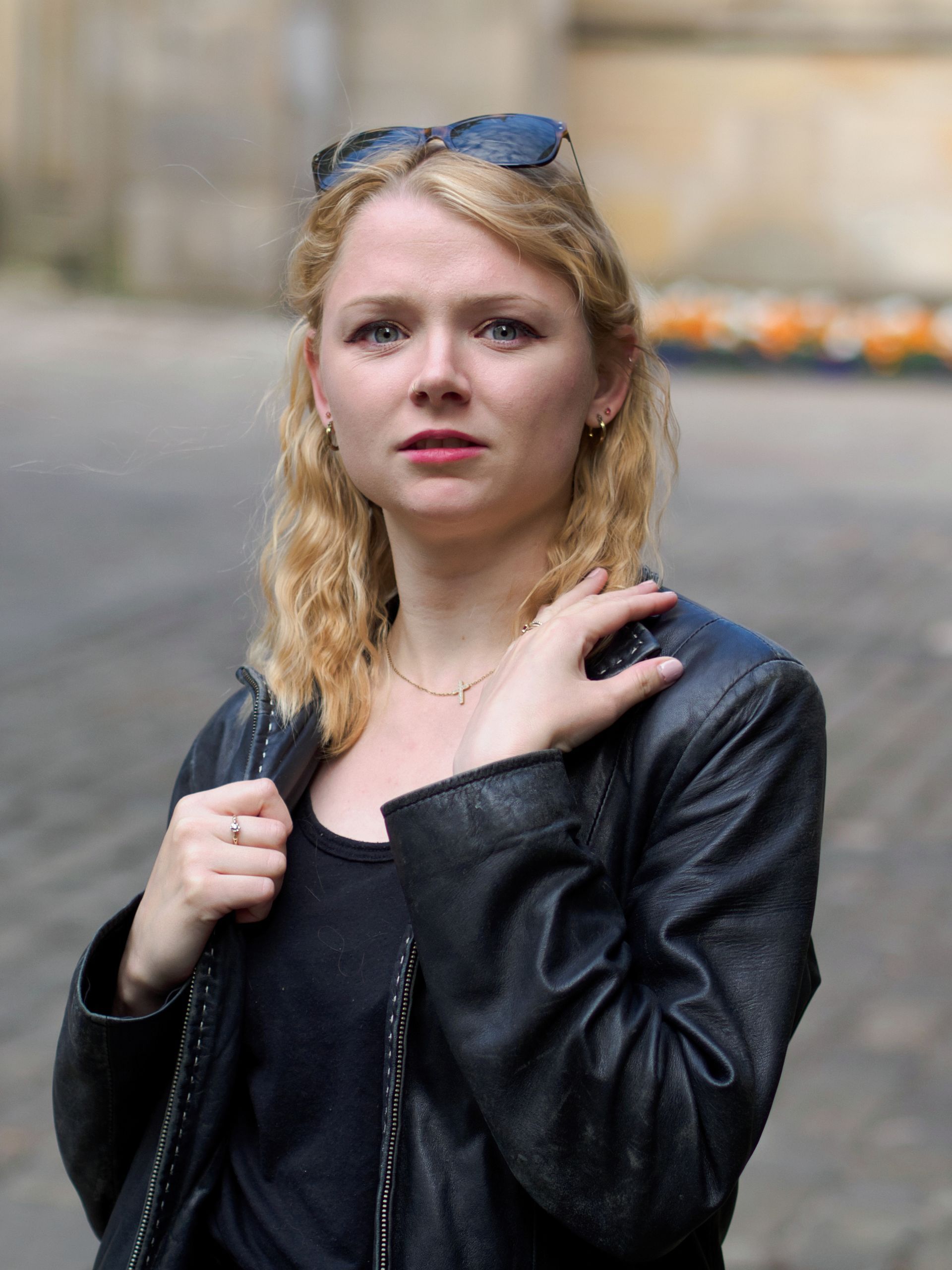 A female model pictured in a cathedral square