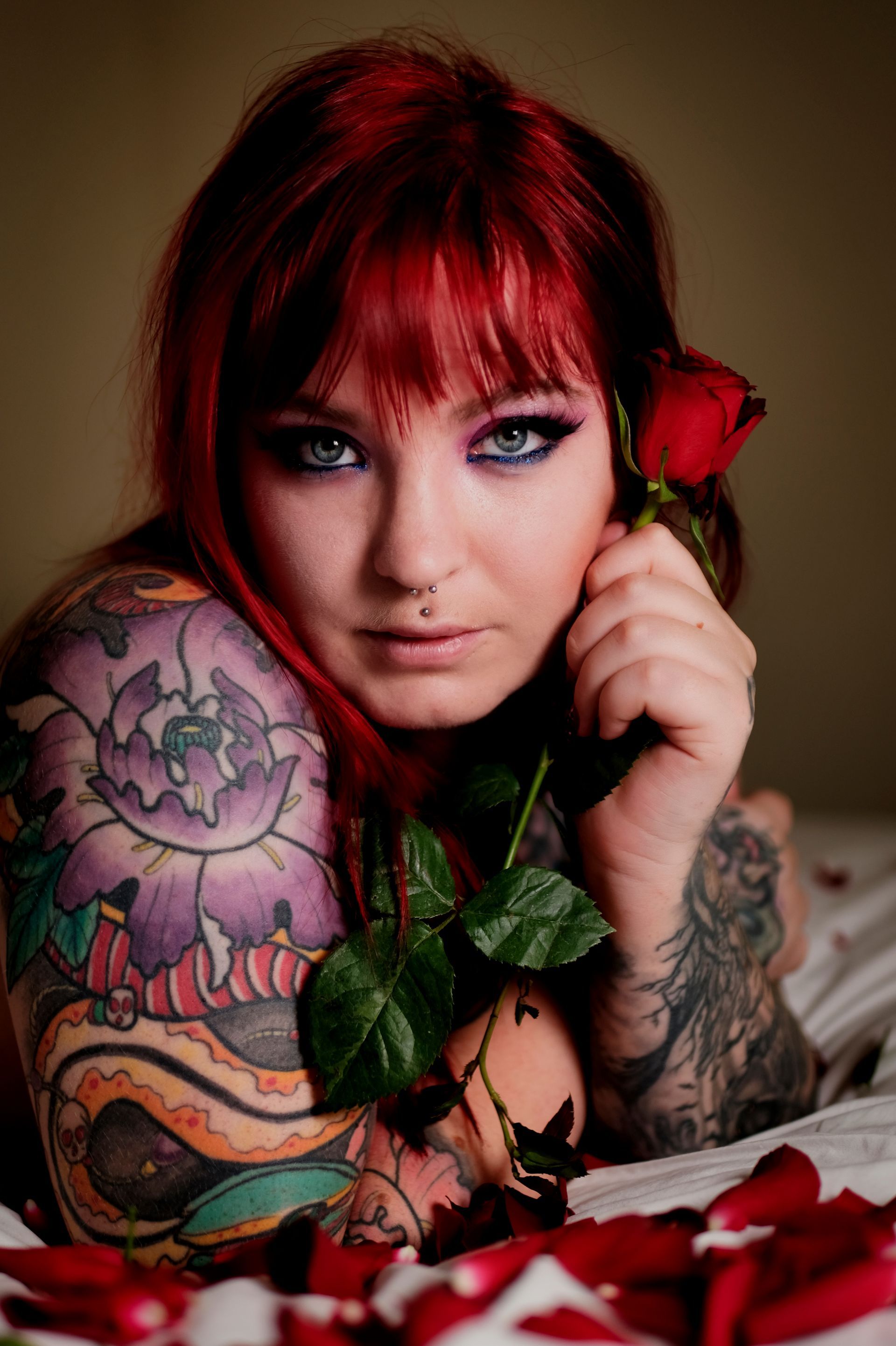 A portrait of a young lady with a rose in her hand