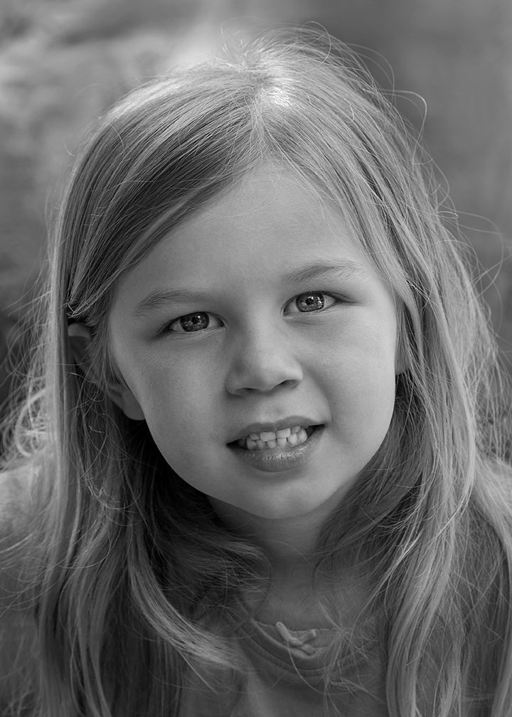 a portrait of a young girl