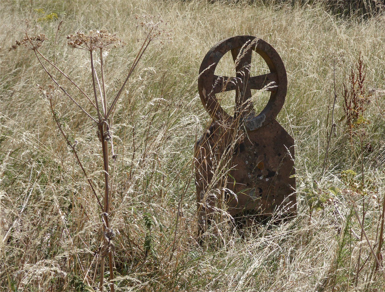 a gravestone in a church yard