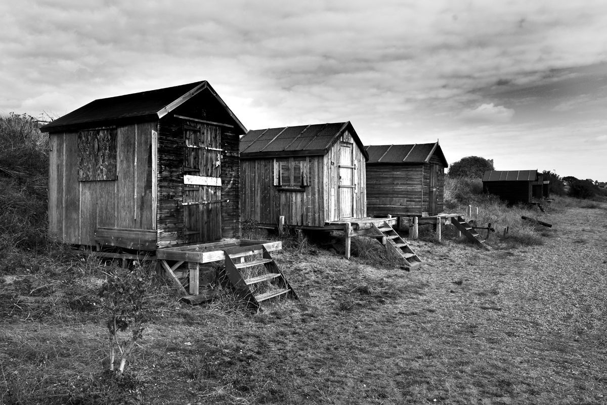 a row of beach huts