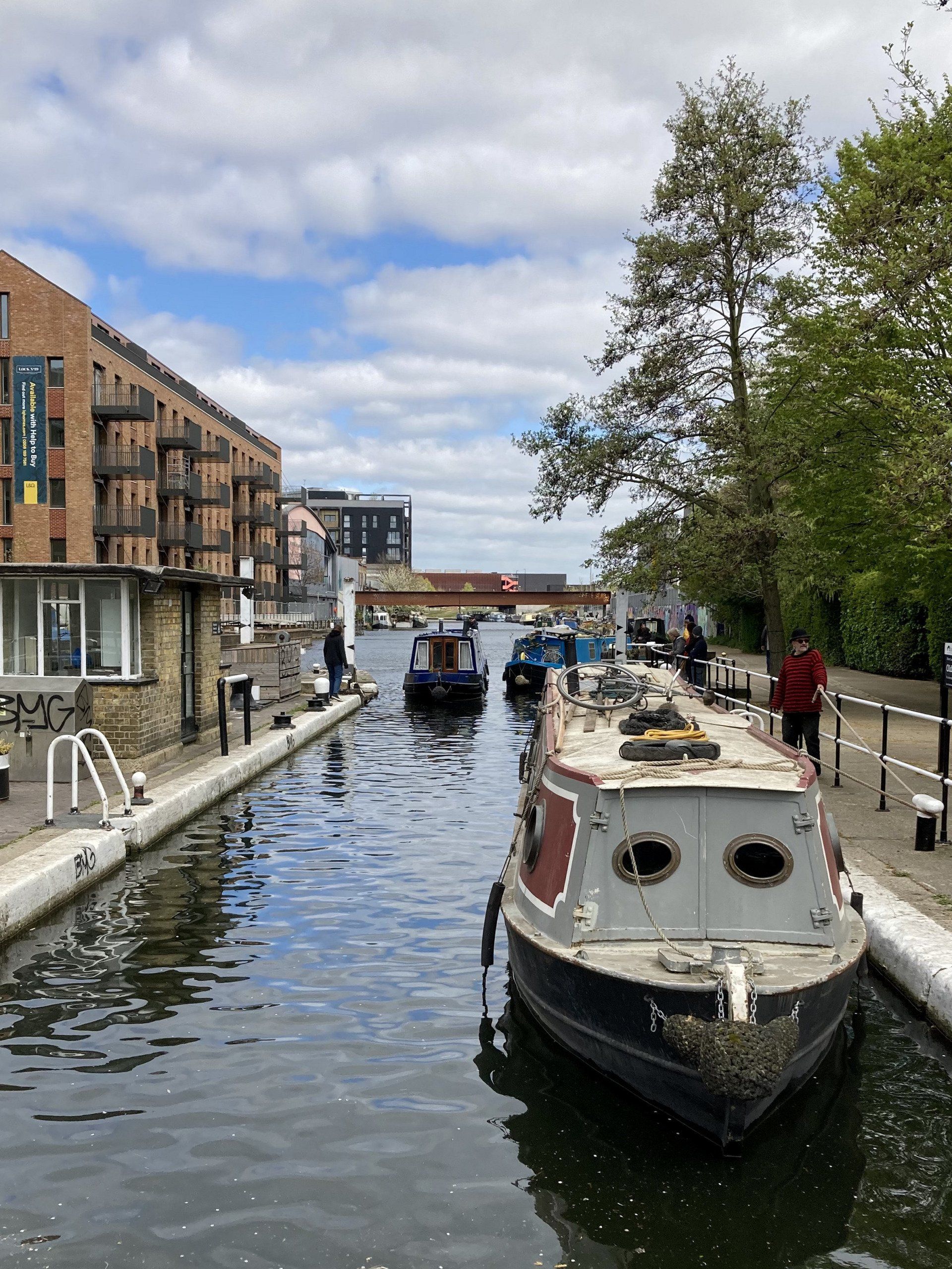 canal barges entering a lock on the lee navigation in london