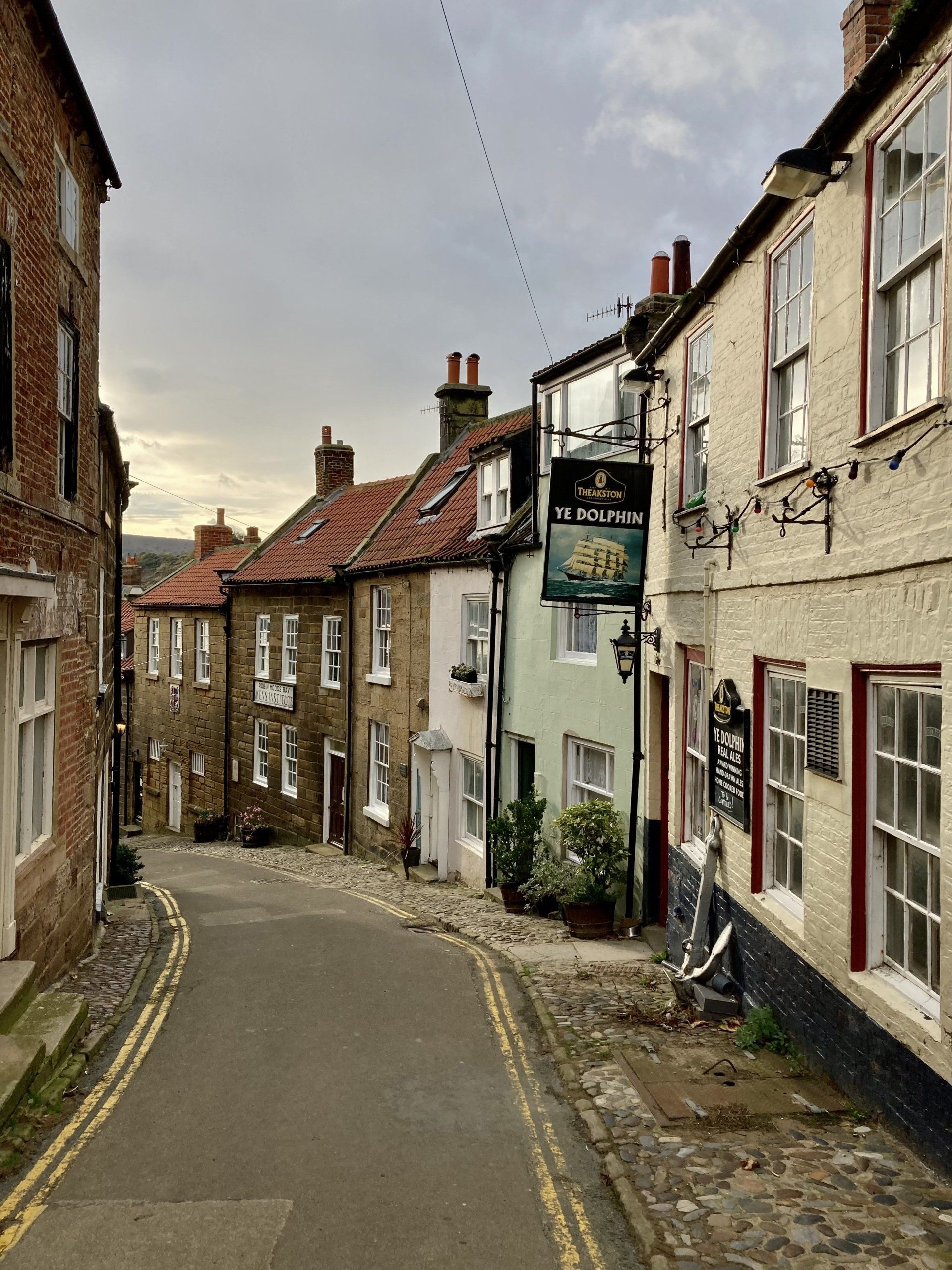 a street scene in robin hoods bay