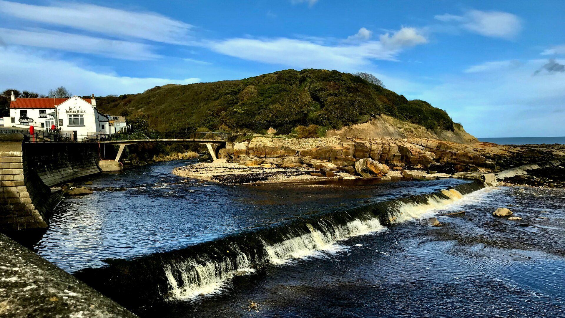 Scalby Mill by: Derek Smith a river weir near scarborough