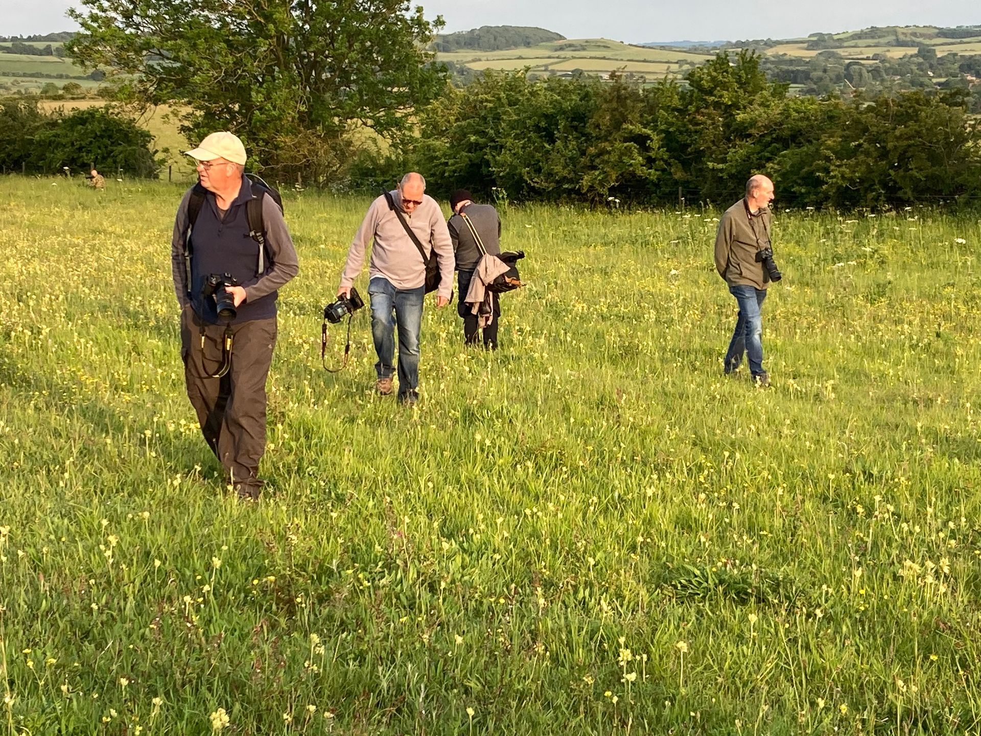 Society members in the meadow