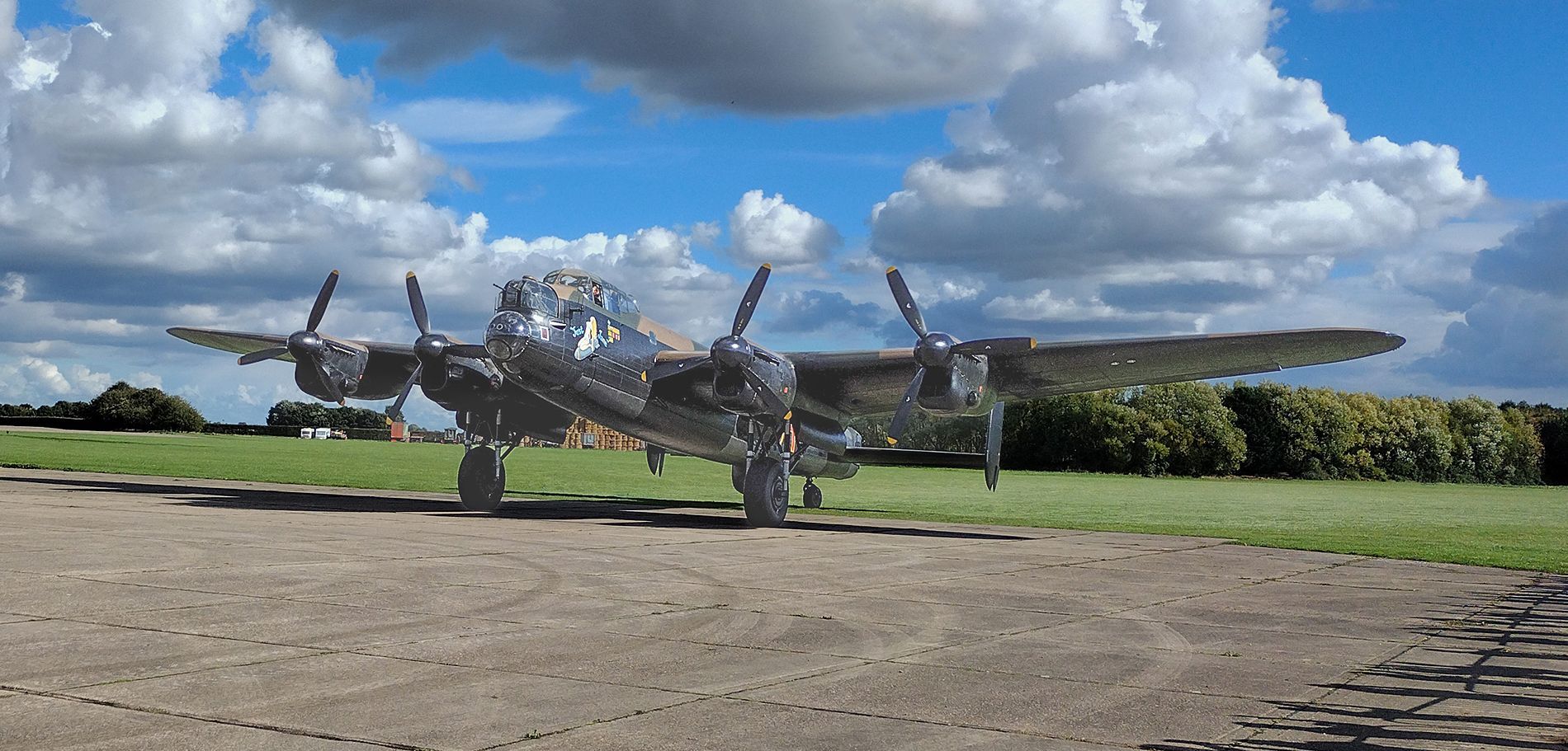 a heritage Lancaster bomber aircraft on the pan