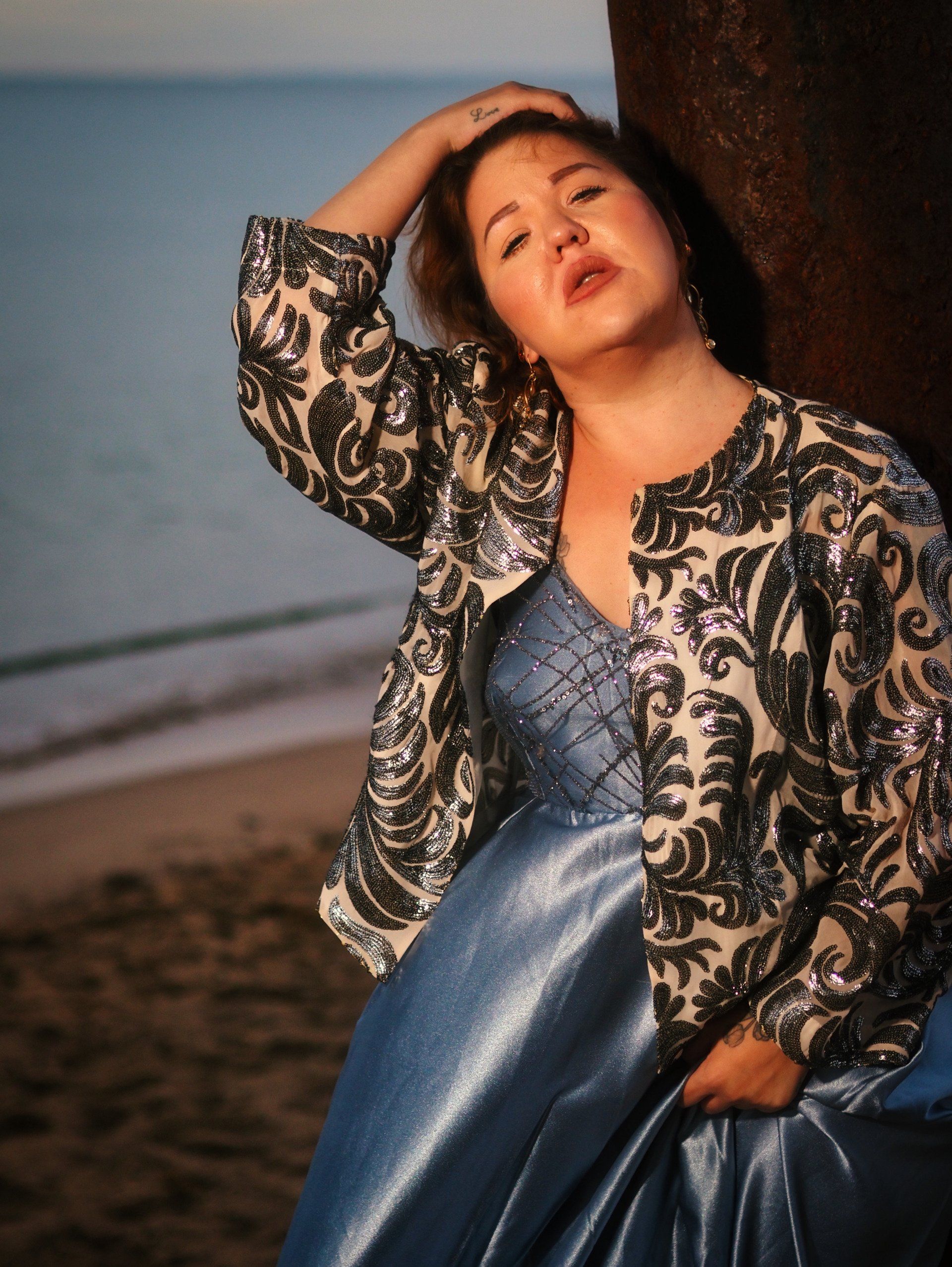 a photo shoot with a model on skegness beach at sunrise