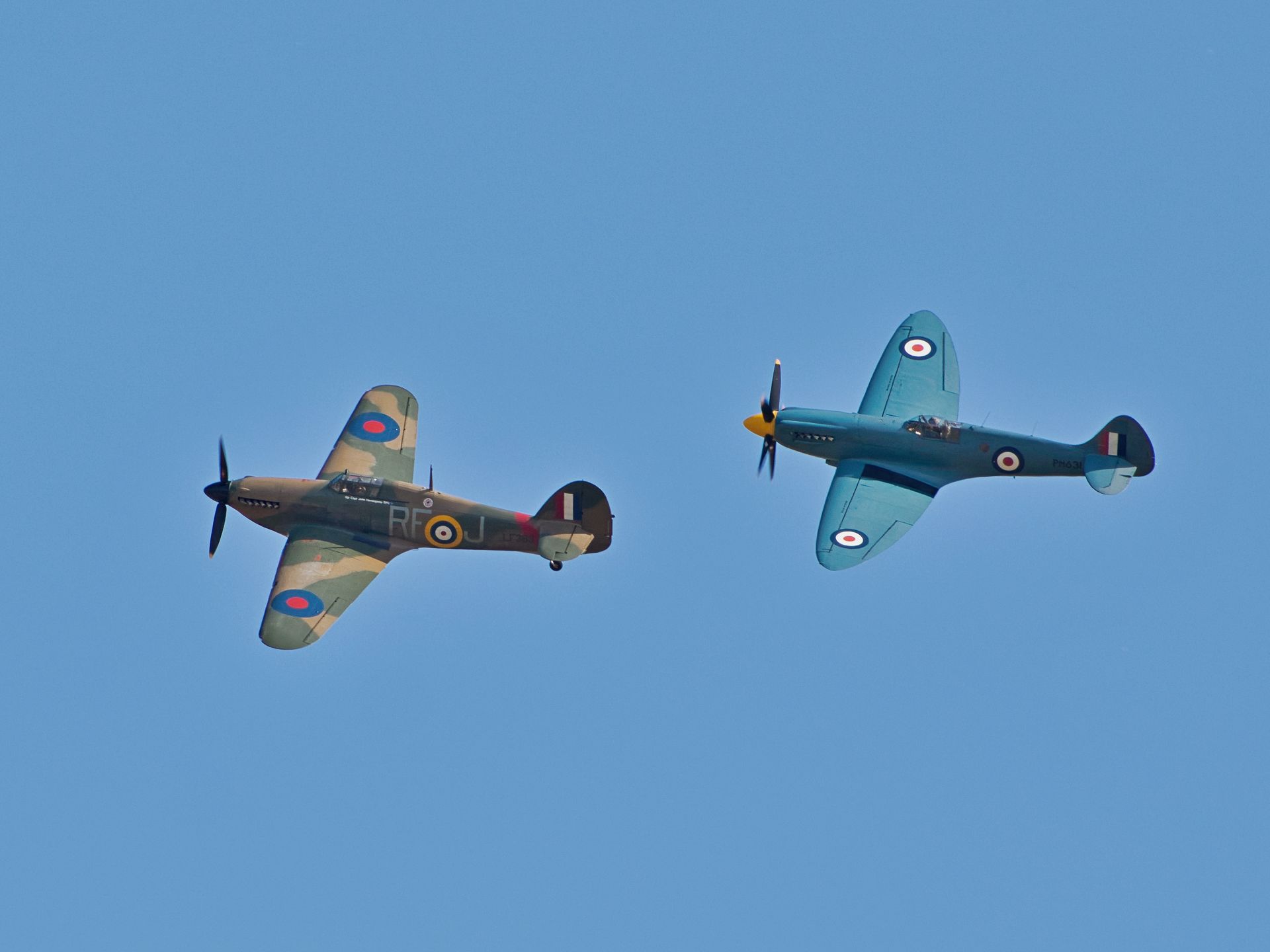 The Hurricane, and Spitfire aircraft in a fly-past