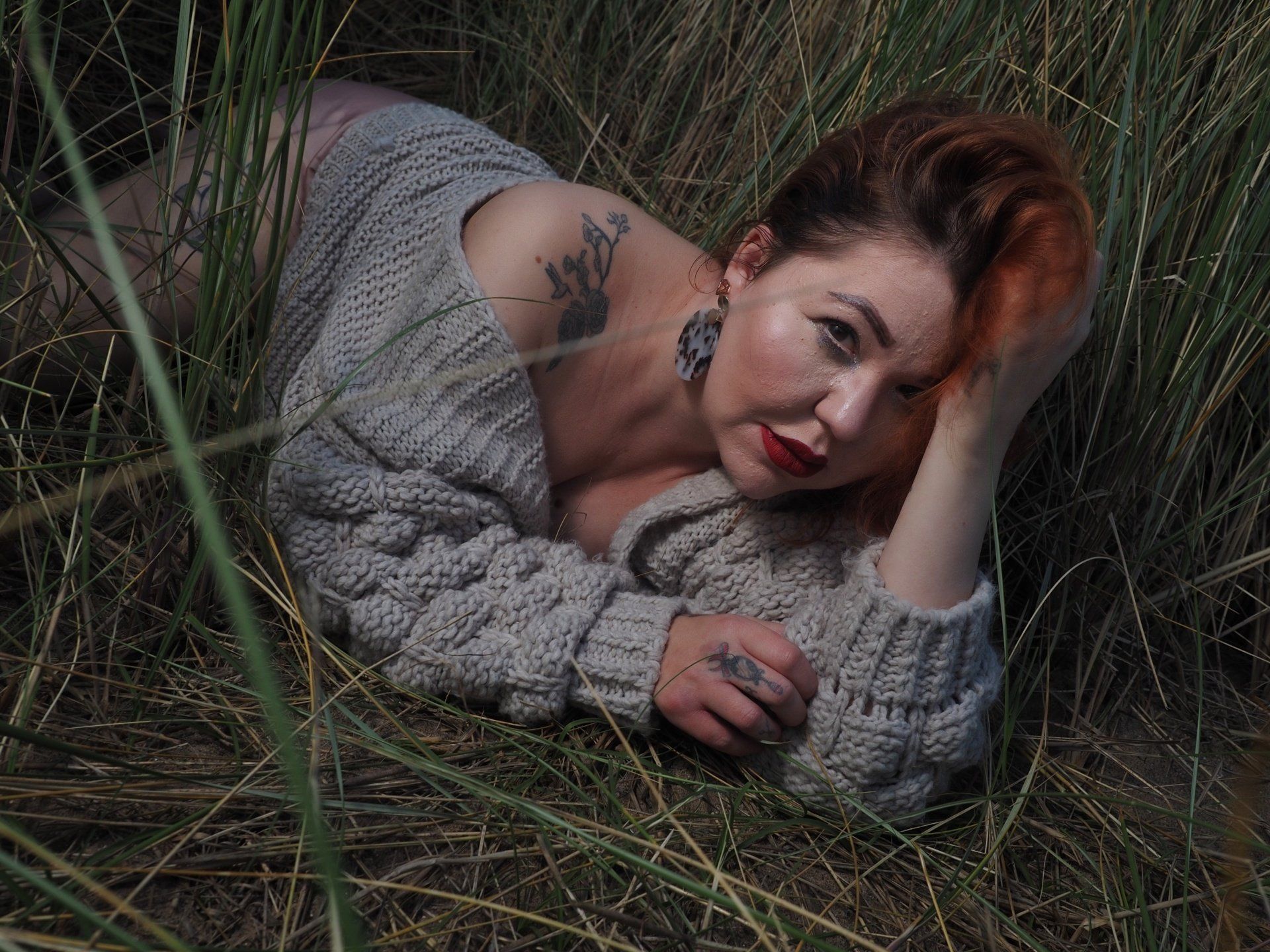 a young female model amongst the sand dunes