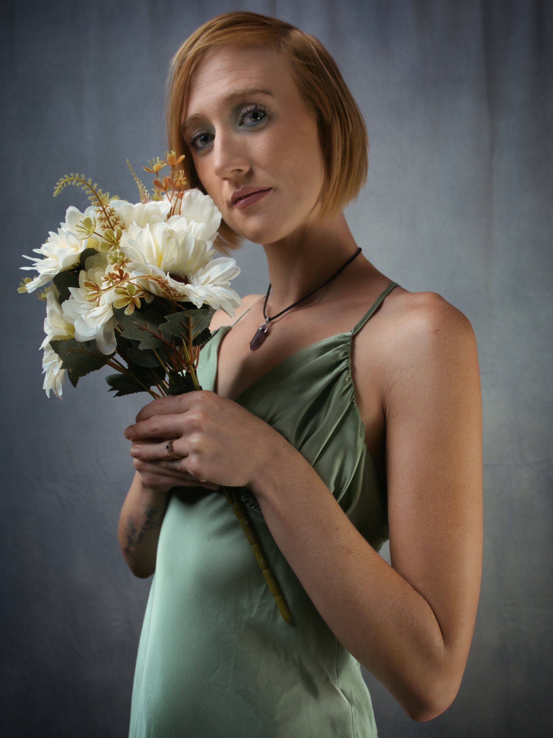 Jade by Derek Smith a female model in a studio with flowers